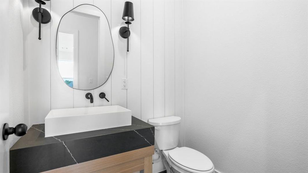 Bathroom with vanity and toilet