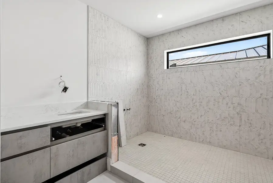 Primary bathroom with dual vanities; walk in shower Primary bathroom with dual vanities; walk in shower