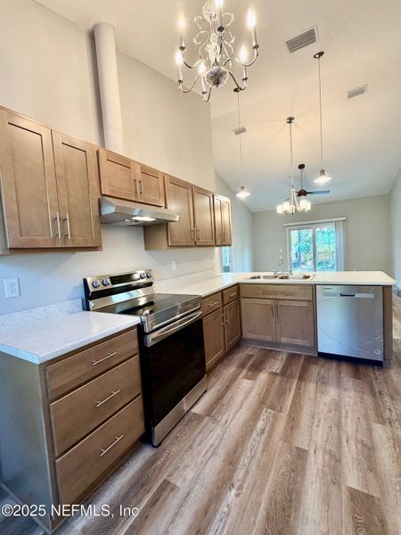 Furnished interior view inside a new home in , Green Cove Springs (Image 2).