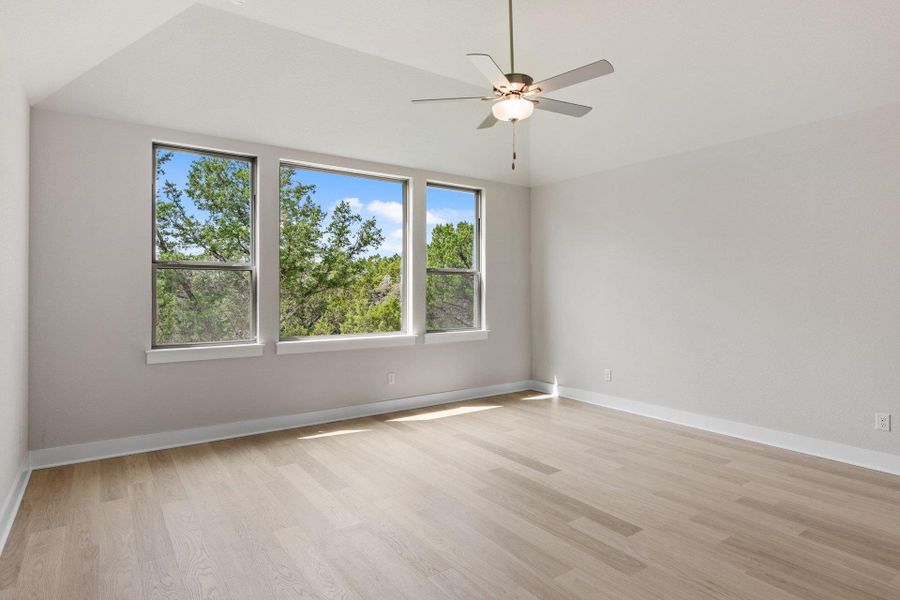 Primary Bedroom with elevated ceiling