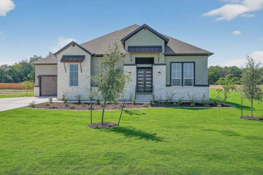 Front exterior of a new home in Feathergrass, Georgetown, TX, highlighting curb appeal (Image 21).