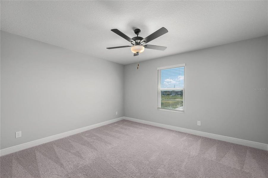 Spacious, unfurnished interior of a new home in Gum Lake Preserve, Lake Alfred (Image 13).