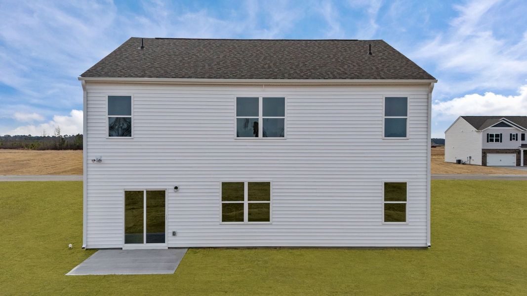 Exterior details and patio area of a home in Ridgewood Farms, Winterville (Image 24). Exterior details and patio area of a home in Ridgewood Farms, Winterville (Image 24).