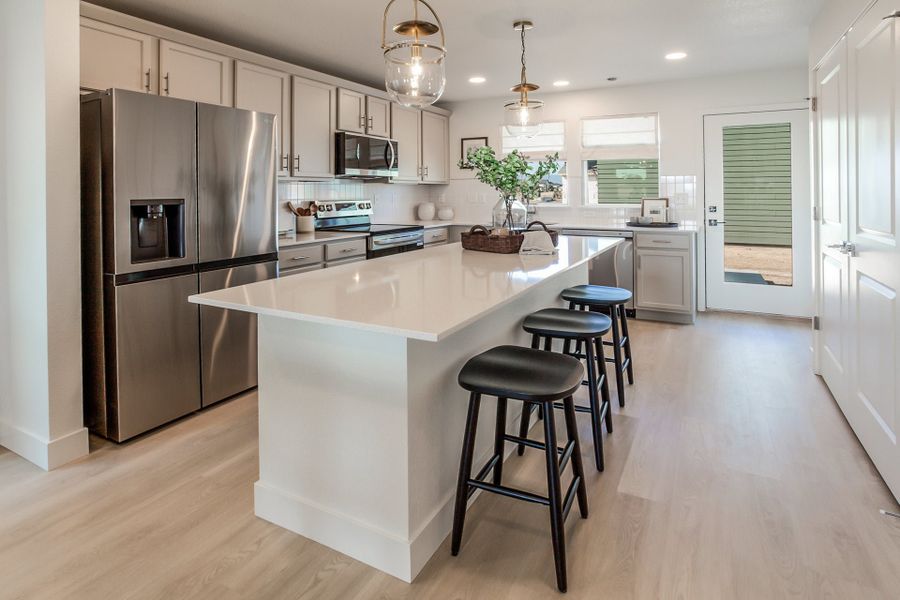 Representative furnished interior of a home built from the Clover by Hartford Homes in Prairie Song Cottages, Windsor (Image 8). Representative furnished interior of a home built from the Clover by Hartford Homes in Prairie Song Cottages, Windsor (Image 8).