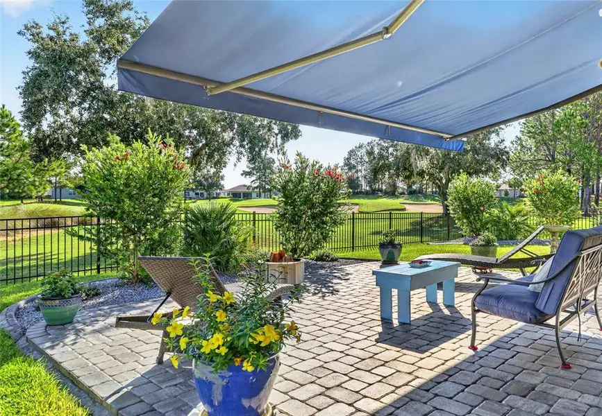 Exterior details and patio area of a home in , Ocala (Image 3).