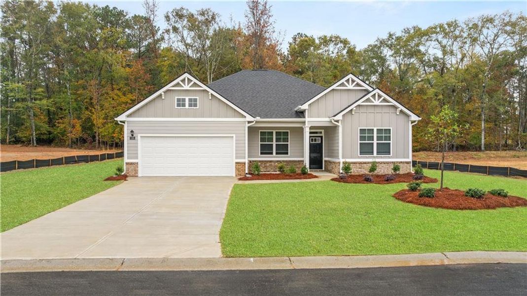 Front exterior of a new home in Kingston Ranch at Lake Oconee, Buckhead, GA, highlighting curb appeal (Image 1). Front exterior of a new home in Kingston Ranch at Lake Oconee, Buckhead, GA, highlighting curb appeal (Image 1).