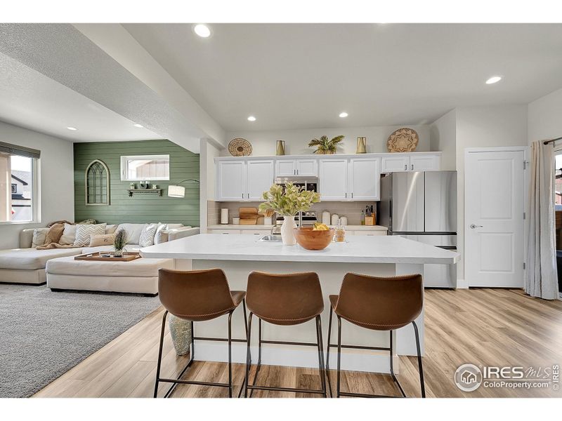 Kitchen with Island and Stainless Steel appliances