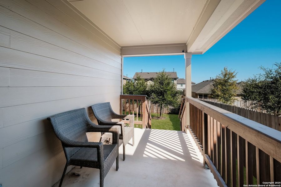 Exterior details and patio area of a home in Redbird Ranch, San Antonio (Image 26).