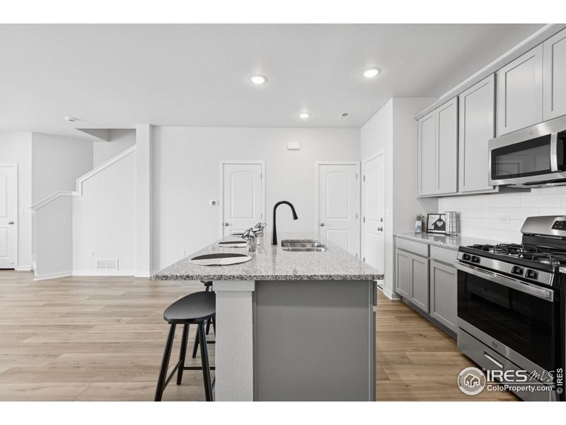 Furnished interior view inside a new home in Kinston Mainstreet Townhomes, Loveland (Image 15). Furnished interior view inside a new home in Kinston Mainstreet Townhomes, Loveland (Image 15).