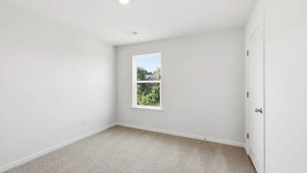 Spacious, unfurnished interior of a new home in Ben Hurt Road, Lyman (Image 32).