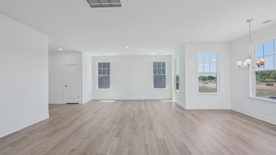 Furnished interior view inside a new home in Sidney Creek Single Family, Zebulon (Image 7).
