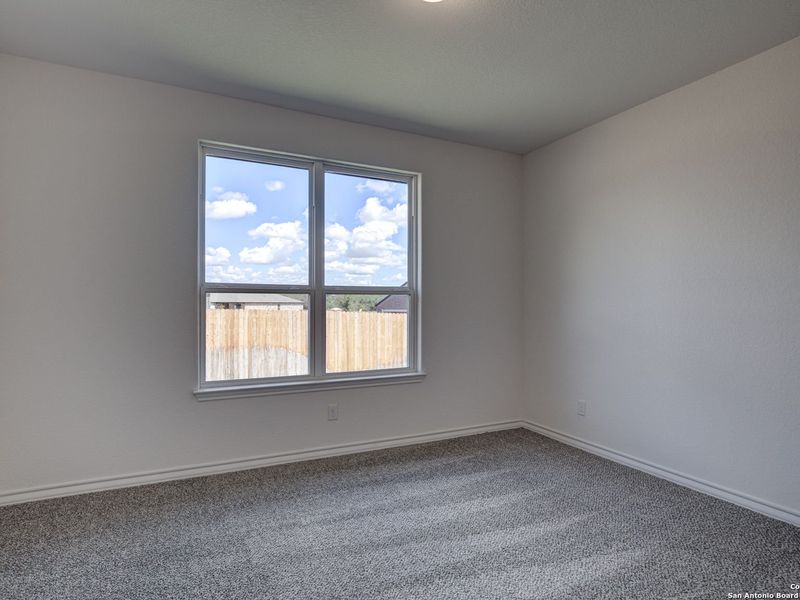 Spacious, unfurnished interior of a new home in The Reserve at Potranco Oaks, Castroville (Image 41).