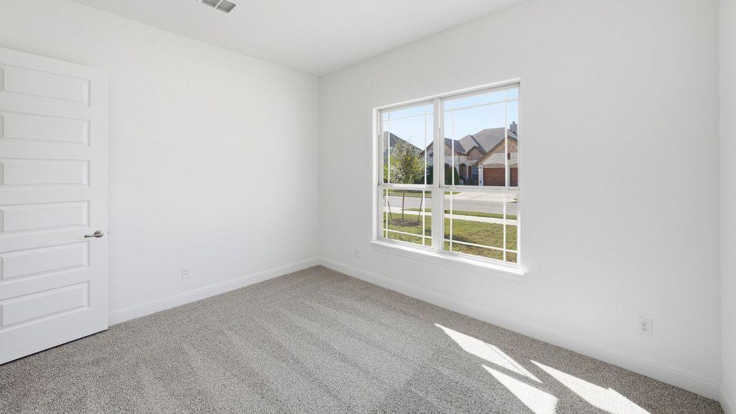 Furnished interior view inside a new home in Oaks at San Gabriel, Georgetown (Image 14).