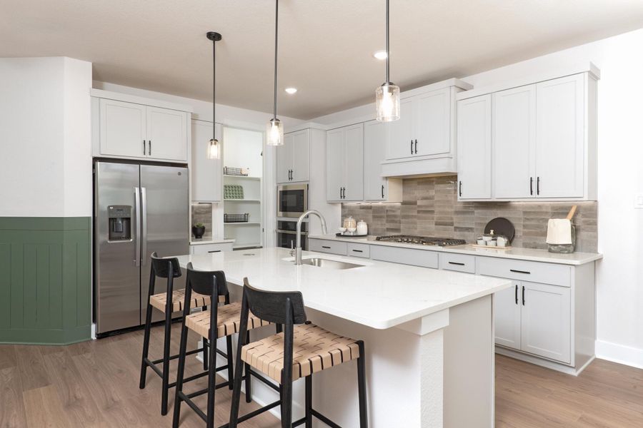 Representative furnished interior of a home built from the Winfield by Tri Pointe Homes in Prairie Collection at The Meadows, Krum (Image 7).