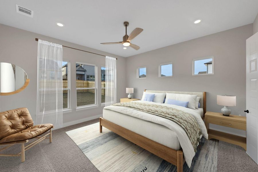 Carpeted bedroom featuring recessed lighting, visible vents, multiple windows, and ceiling fan Carpeted bedroom featuring recessed lighting, visible vents, multiple windows, and ceiling fan