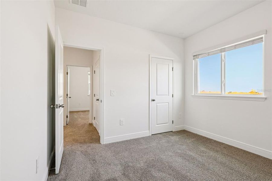 Spacious, unfurnished interior of a new home in Cyrene at Minneola - Villas, Minneola (Image 23).