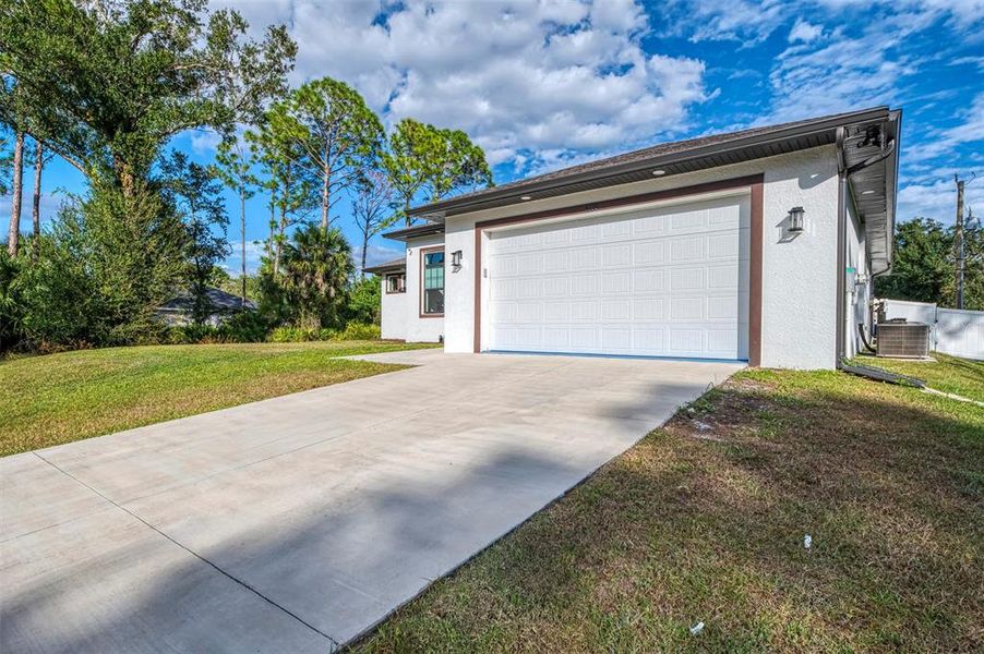 Exterior details and patio area of a home in , North Port (Image 32).