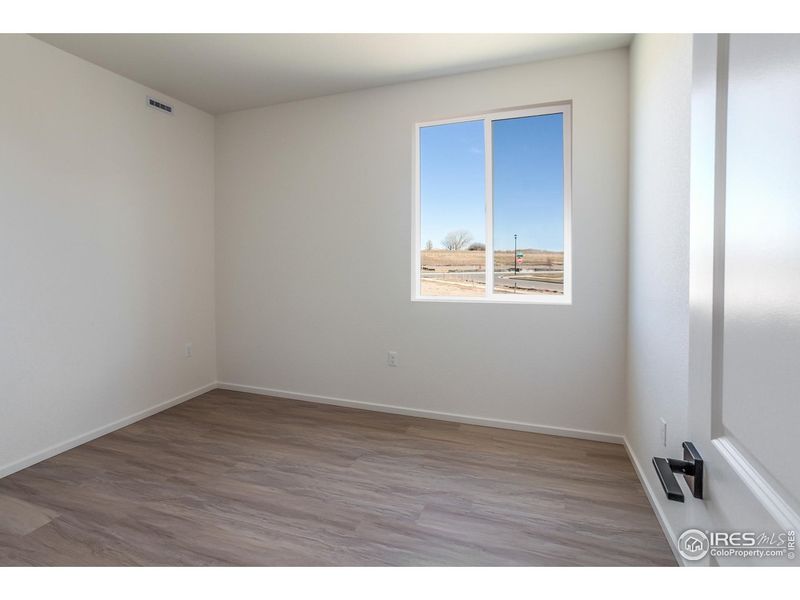 Spacious, unfurnished interior of a new home in Bloom Trailblazer Collection - Single Family Homes, Fort Collins (Image 24).