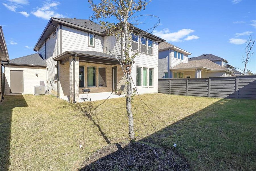 Exterior details and patio area of a home in Garden Collection at Union Park, Little Elm (Image 3).
