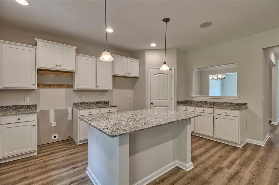 This spacious kitchen offers ample cabinet storage