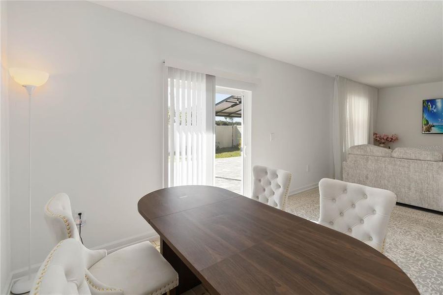 Furnished interior view inside a new home in Peace Creek Reserve: Manor Key Collection, Winter Haven (Image 15).