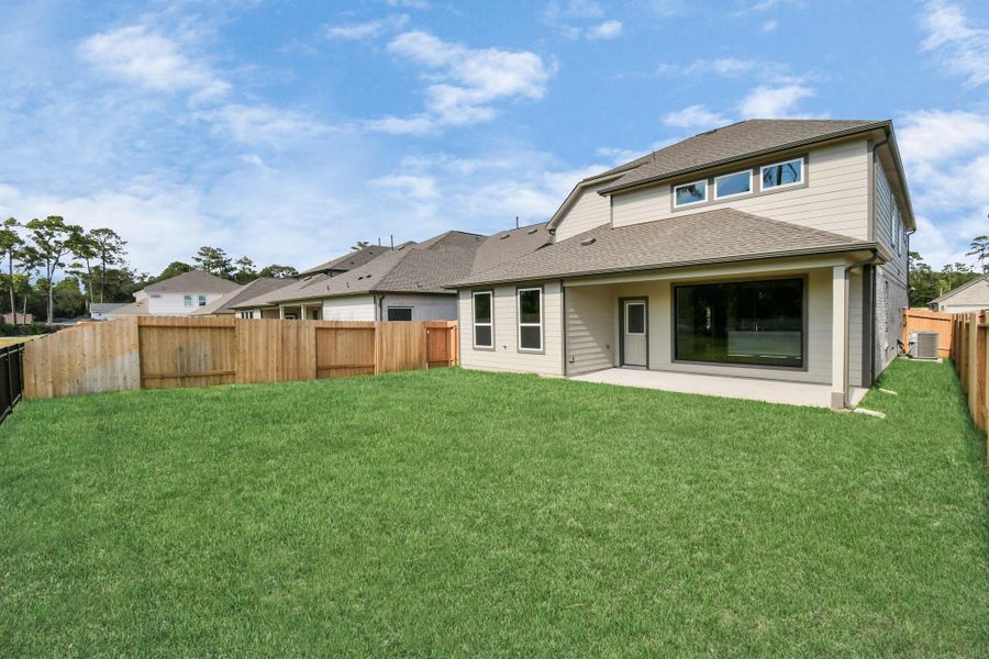 Backyard retreat, offering an abundance of space for kids to play and explore. The possibilities are endless in this outdoor haven, where the joy of open-air activities and family gatherings awaits. Backyard retreat, offering an abundance of space for kids to play and explore. The possibilities are endless in this outdoor haven, where the joy of open-air activities and family gatherings awaits.