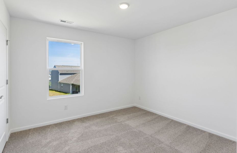 Spacious, unfurnished interior of a new home in Highlands of Carter's Station, Columbia (Image 32).