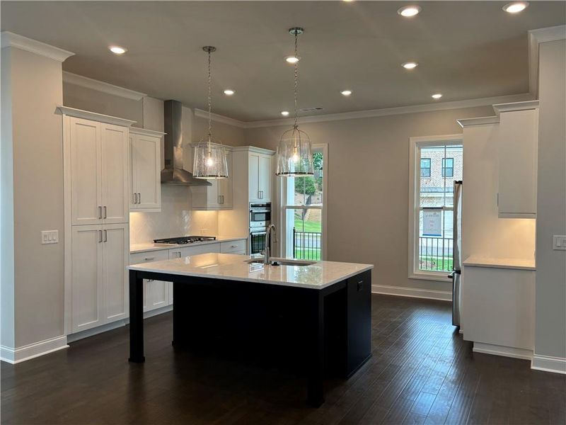 Furnished interior view inside a new home in Brackley Single Family, Cumming (Image 8).