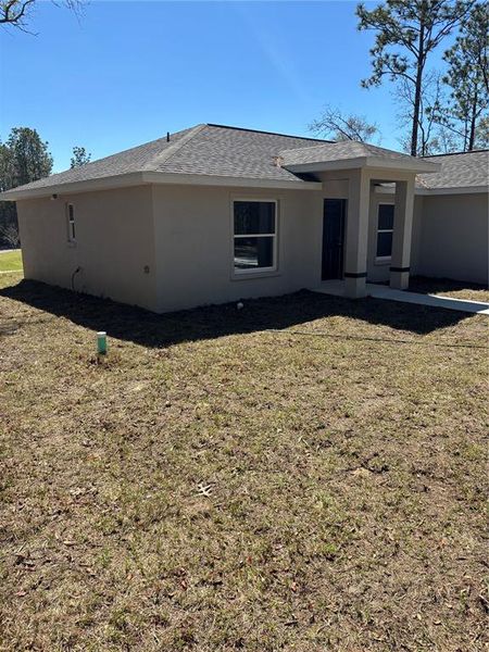 Exterior details and patio area of a home in , Citrus Springs (Image 26).