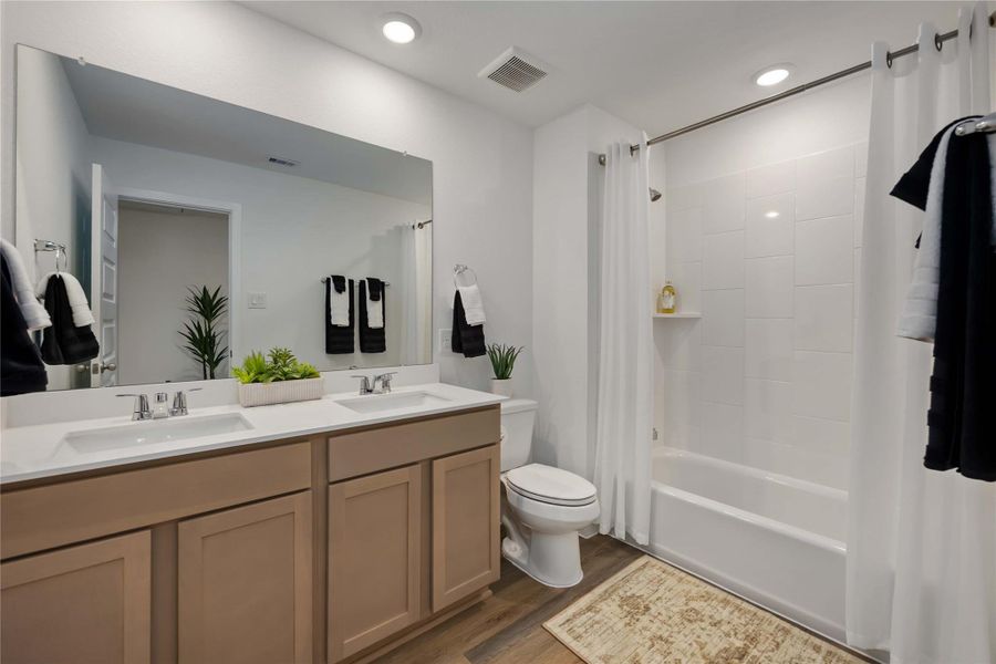 Furnished interior view inside a new home in Grand West, Houston (Image 26).