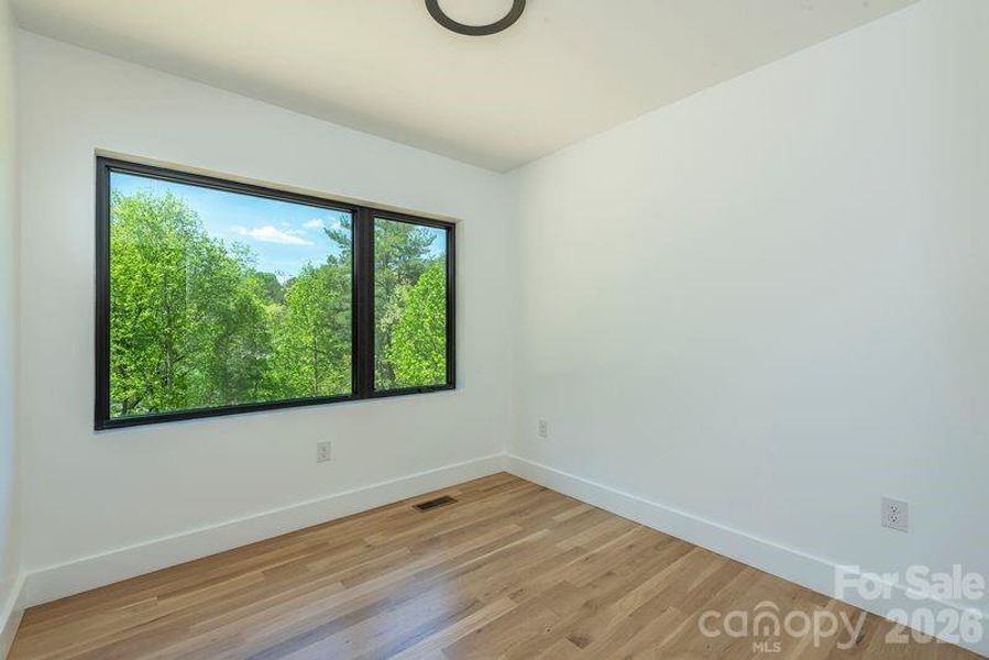 Spacious, unfurnished interior of a new home in , Asheville (Image 15).