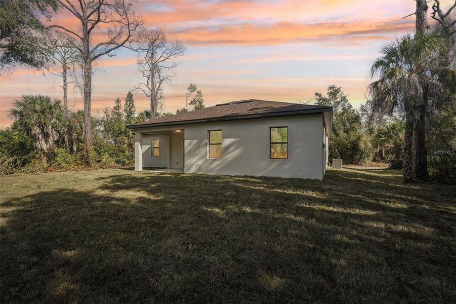 Exterior details and patio area of a home in , North Port (Image 27).
