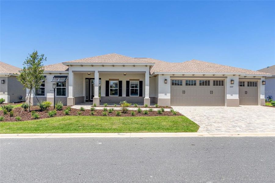 Front exterior of a new home in , Ocala, FL, highlighting curb appeal (Image 19). Front exterior of a new home in , Ocala, FL, highlighting curb appeal (Image 19).