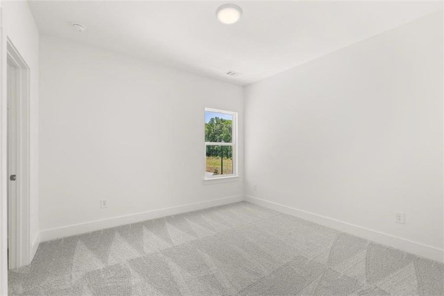 Spacious, unfurnished interior of a new home in Traditions of Braselton, Jefferson (Image 16).