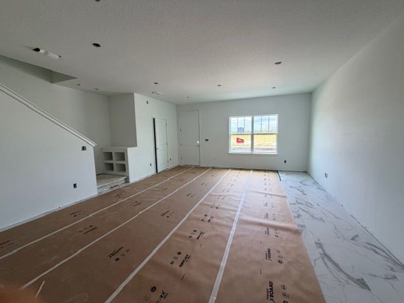 In-progress construction of a new home in Whaley Grove Townhomes, St. Cloud, FL (Image 10).