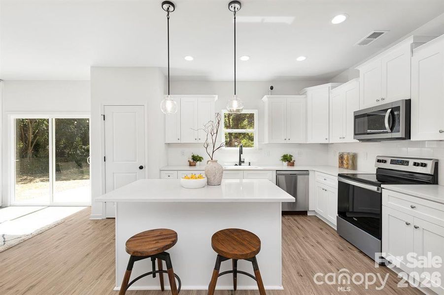 Furnished interior view inside a new home in , Charlotte (Image 9). Furnished interior view inside a new home in , Charlotte (Image 9).