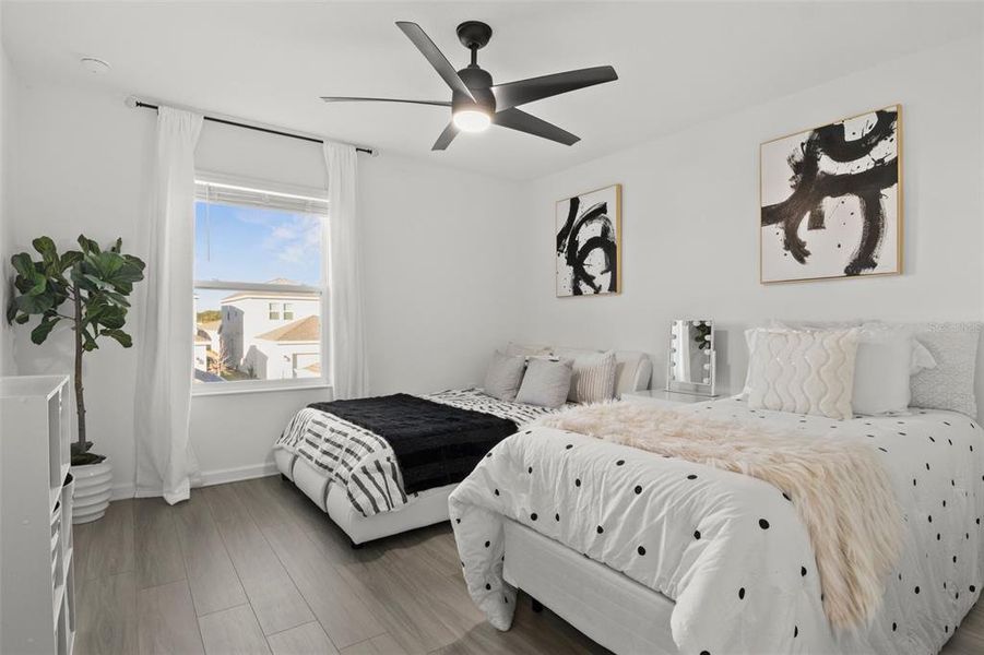 Furnished interior view inside a new home in Tohoqua, Kissimmee (Image 13).