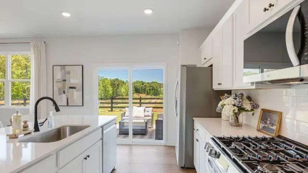 Furnished interior view inside a new home in Reserve at Gum Springs, Jefferson (Image 15).