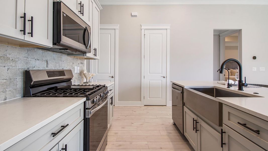 Furnished interior view inside a new home in Breakfast Point East Phase I, Panama City Beach (Image 10).