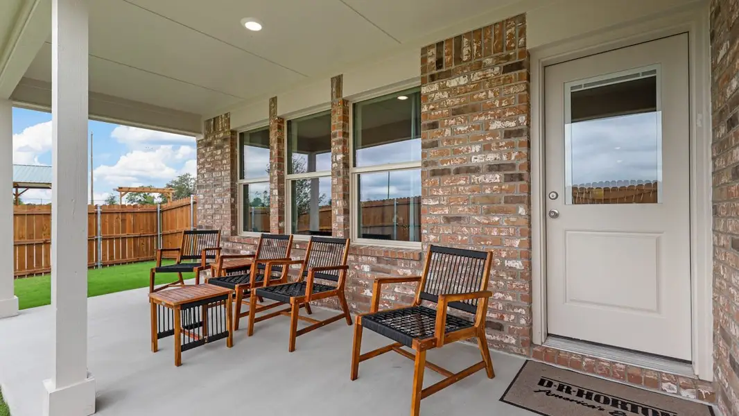 Exterior details and patio area of a home in Bella Vista, Granbury (Image 2).