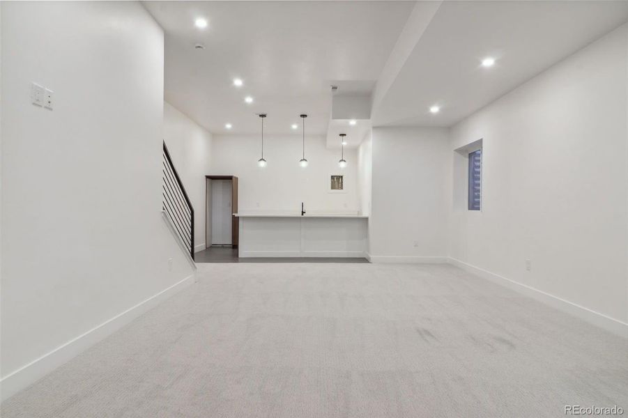 Entertainer’s dream basement with 10ft ceilings and wet bar