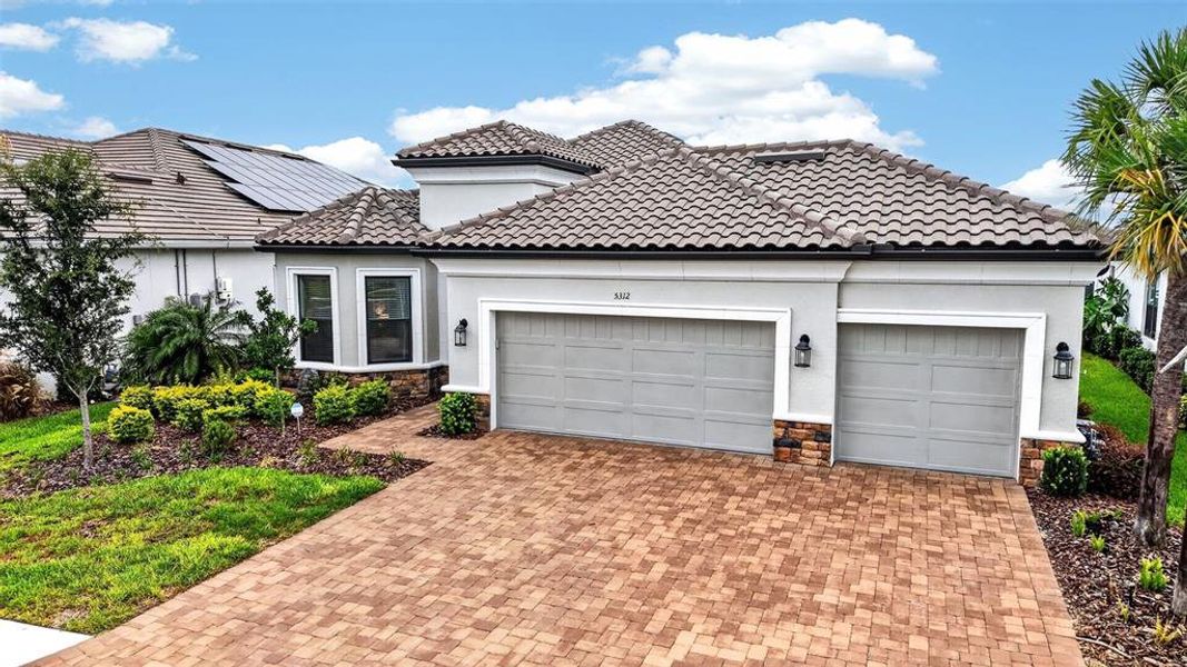 Front exterior of a new home in , Palmetto, FL, highlighting curb appeal (Image 1). Front exterior of a new home in , Palmetto, FL, highlighting curb appeal (Image 1).
