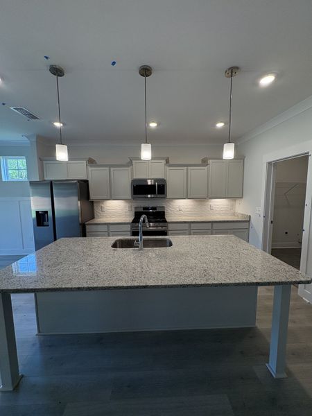 Kitchen Features Oversized island and all stainless steel kitchen appliances Kitchen Features Oversized island and all stainless steel kitchen appliances
