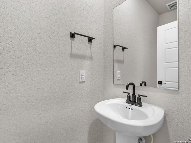 Close-up of interior finishes inside a home in Royal Crest, San Antonio (Image 12).