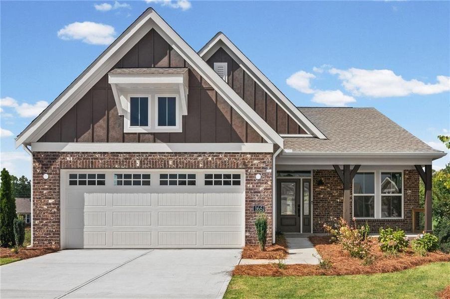 Front exterior of a new home in Laurel Farms, Dallas, GA, highlighting curb appeal (Image 23).