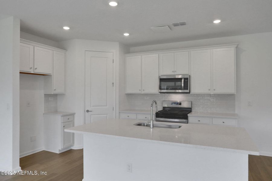 Furnished interior view inside a new home in TrailMark, St. Augustine (Image 4).
