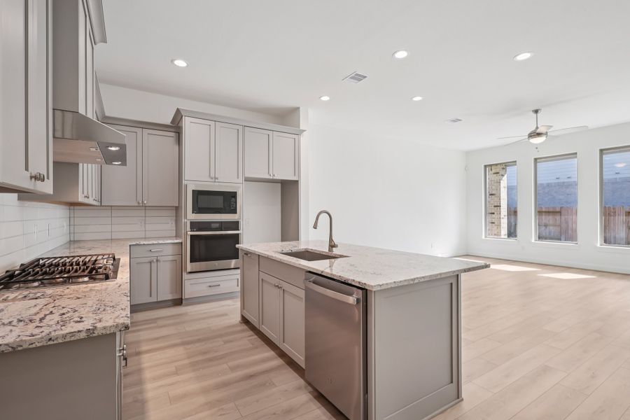 Representative furnished interior of a home built from the Kyle by Risewell Homes in Marvida, Cypress (Image 5).