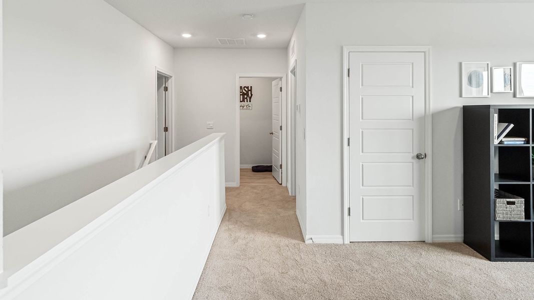 Representative furnished interior of a home built from the HAYDEN by D.R. Horton in Fox Branch, Lakeland (Image 23).