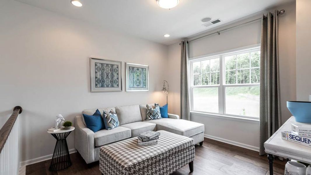 Representative furnished interior of a home built from the London by Taylor Morrison in Walden Woodlands, Huntersville (Image 8). Representative furnished interior of a home built from the London by Taylor Morrison in Walden Woodlands, Huntersville (Image 8).
