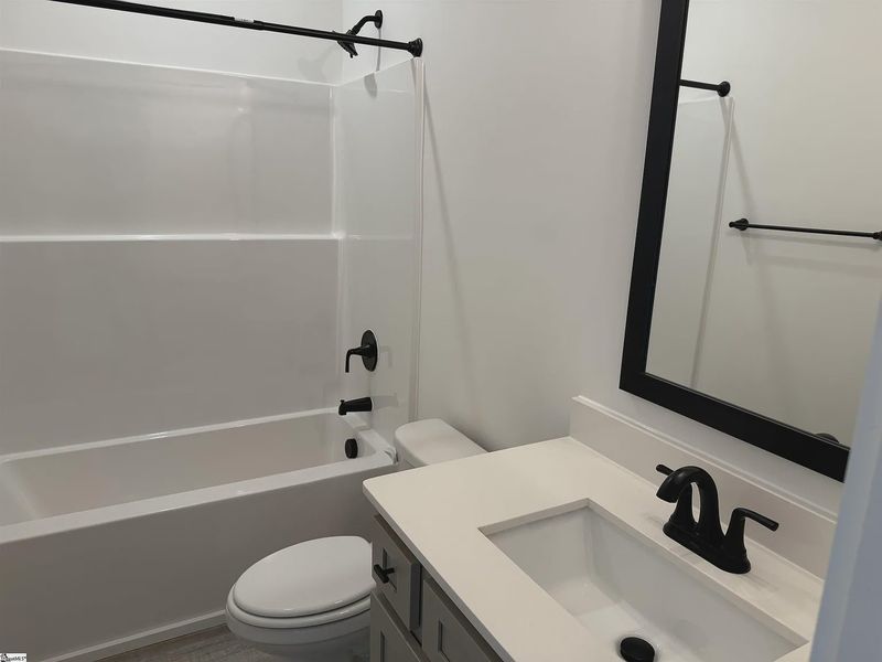 Furnished interior view inside a new home in Hidden Lake Estates, Greenville (Image 4).